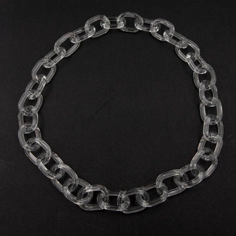 Dark background, clear glass necklace made with bold links