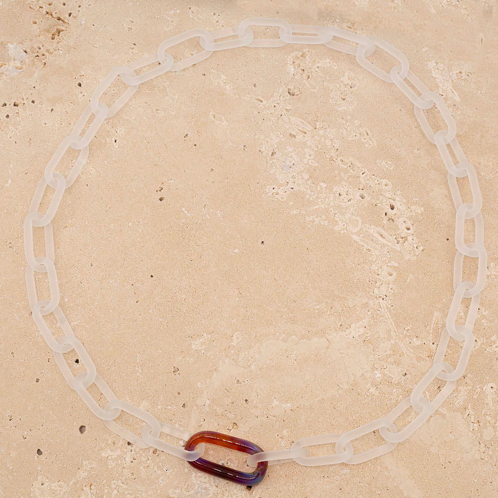 Necklace made from frosted glass links with  single multi colour link.