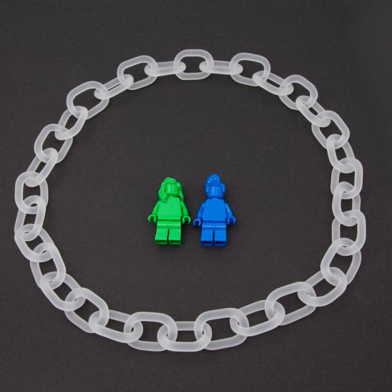 Clear frosted glass chain link necklace photographed with Lego figured for scale