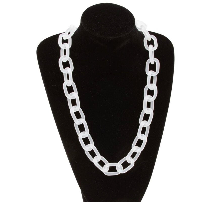 Black velvet bust displaying a clear frosted glass chain necklace