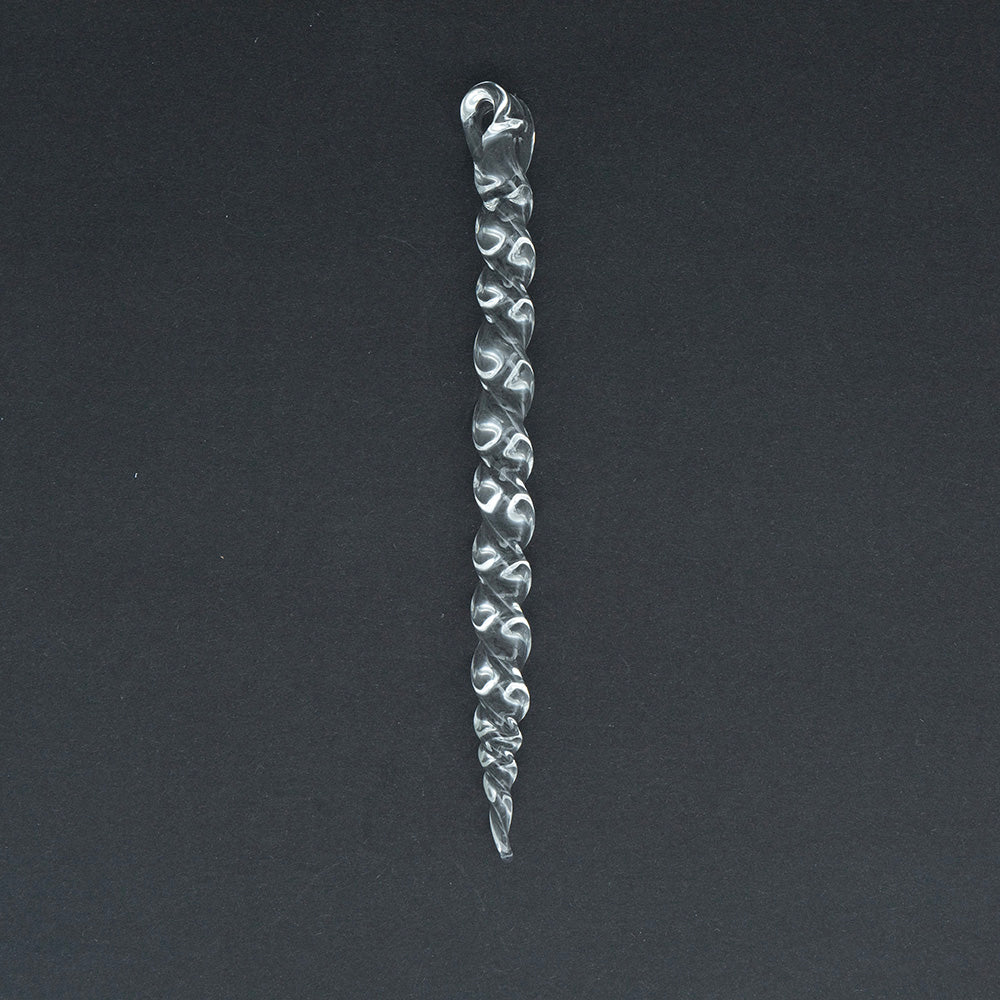 A large glass icicle smade from chunky glass rod.   The icicle twists along itslength and has a hanging loop.