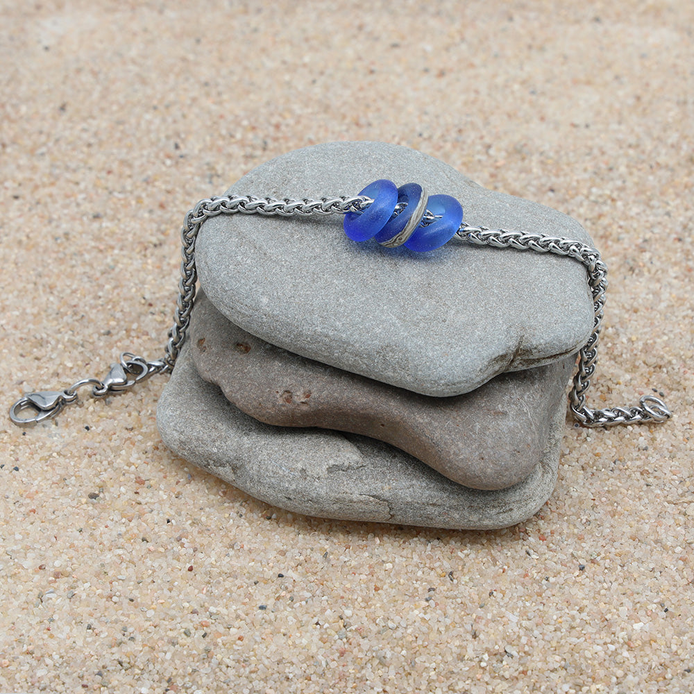Bracelet with 3 Frosted Mid Blue Transparent Glass Beads