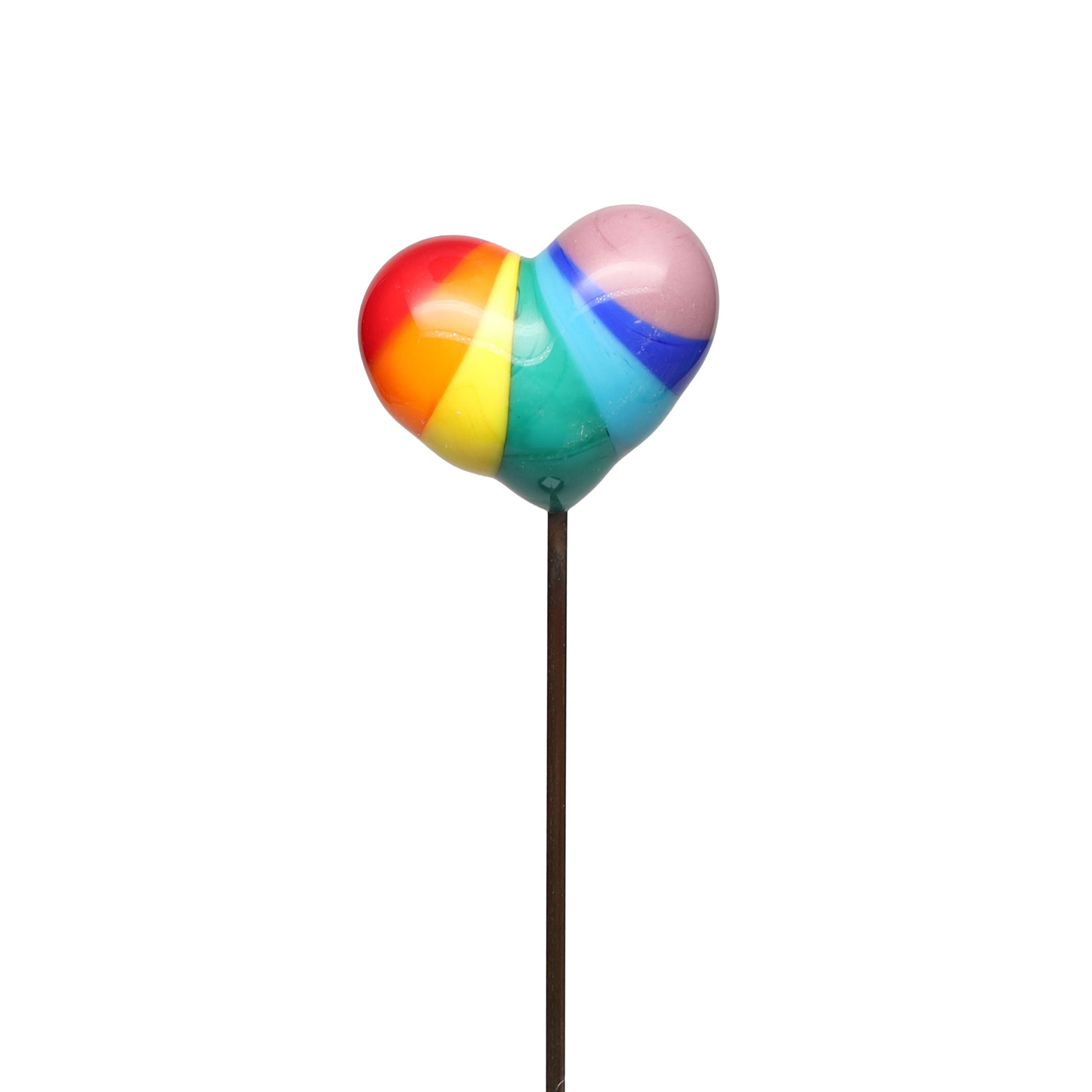 Close-up back view of a handmade rainbow glass heart plant decoration on a white background.