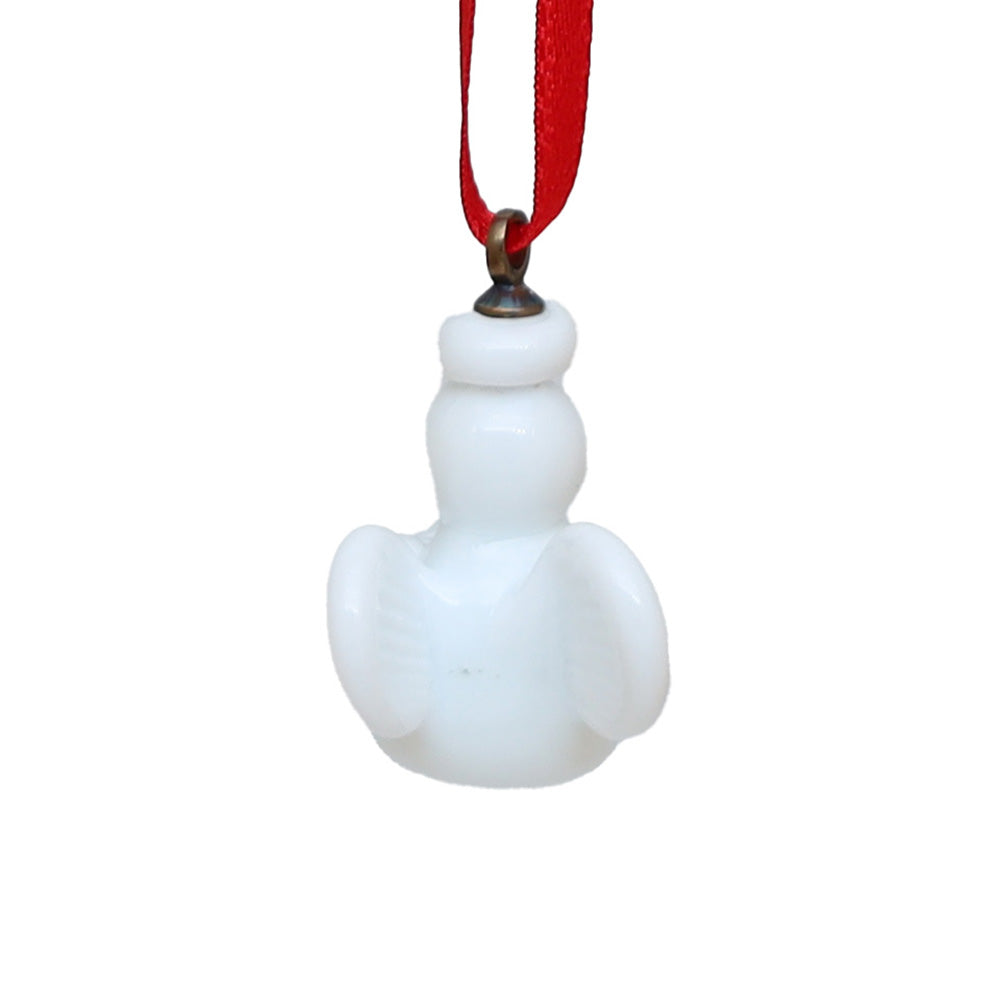 Back view of tiny white glass angel showing wing.