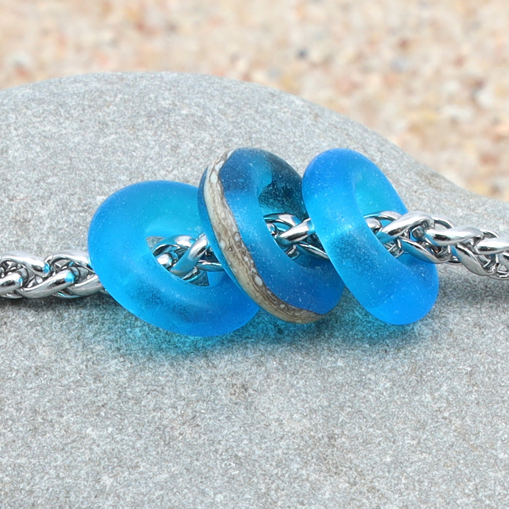 Bracelet with 3 Frosted Turquoise Transparent Glass Beads