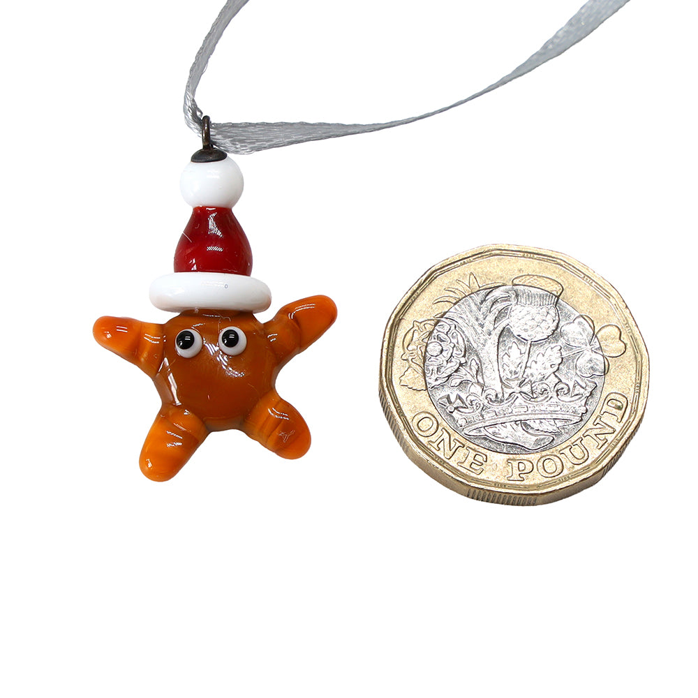 Tiny Glass Christmas Star with Santa Hat