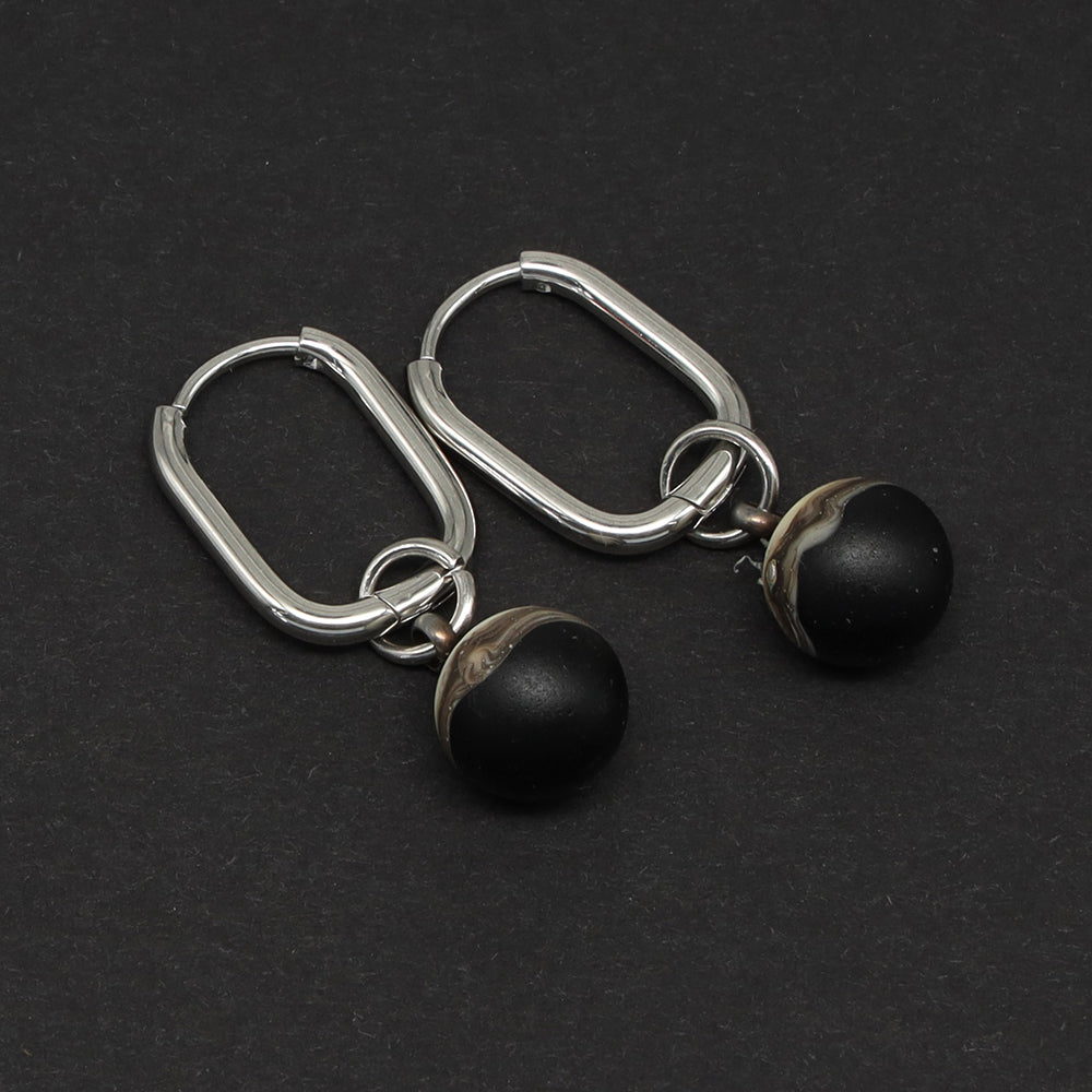 Frosted Black and Ivory Glass Oval Hoop Earrings