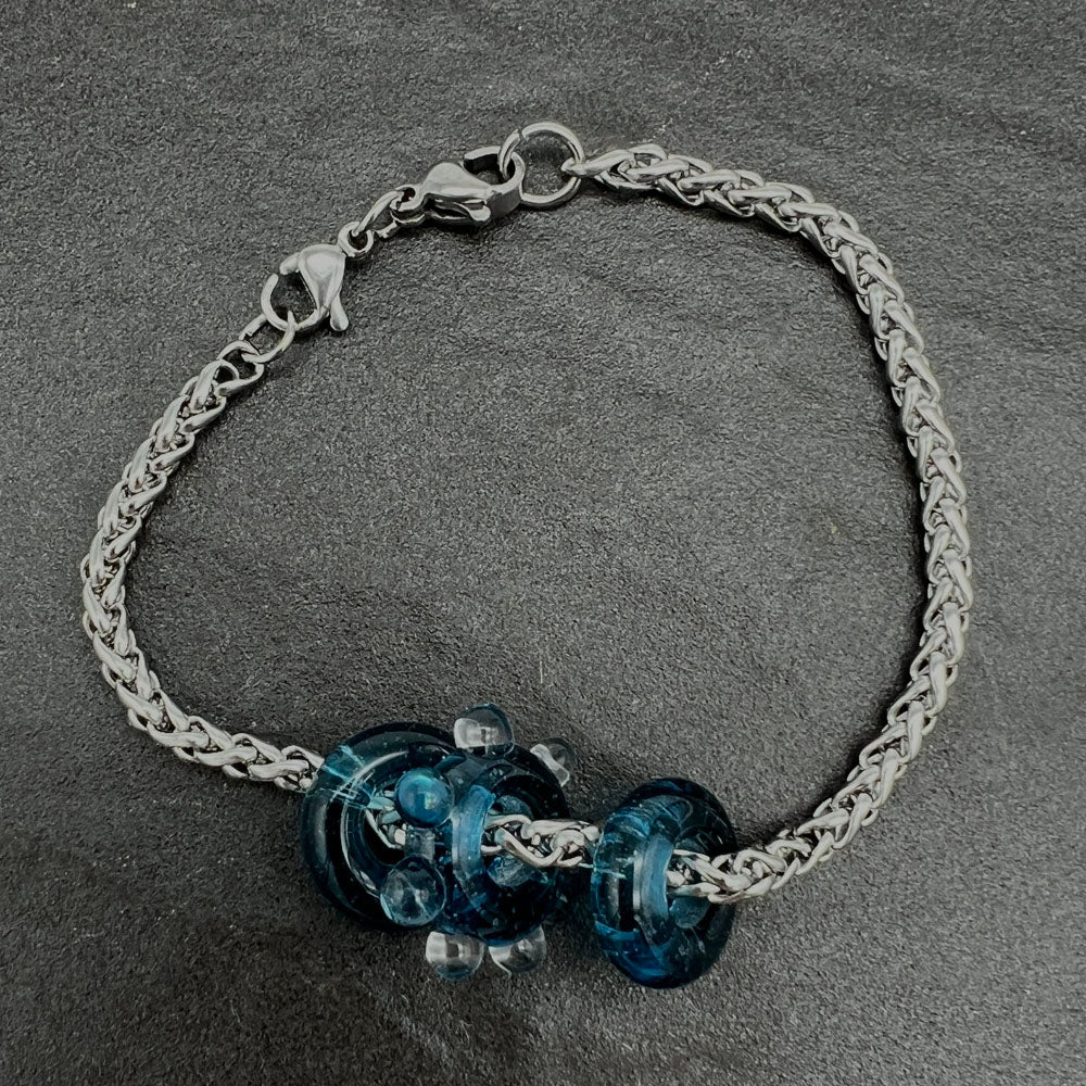 Bracelet with 3 sparkly blue water droplet glass beads
