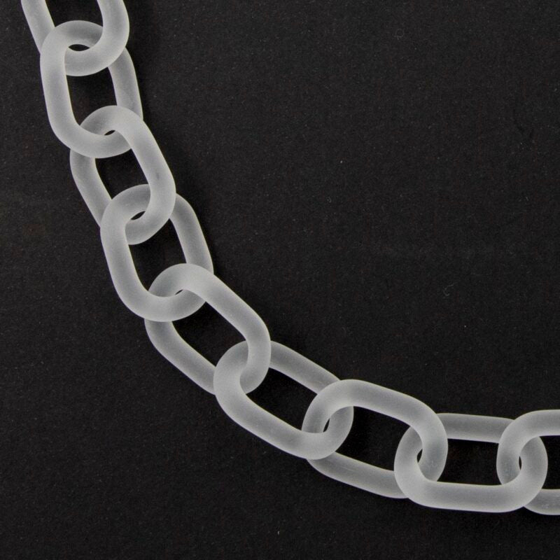 Close up of frosted clear glass necklace made with bold links