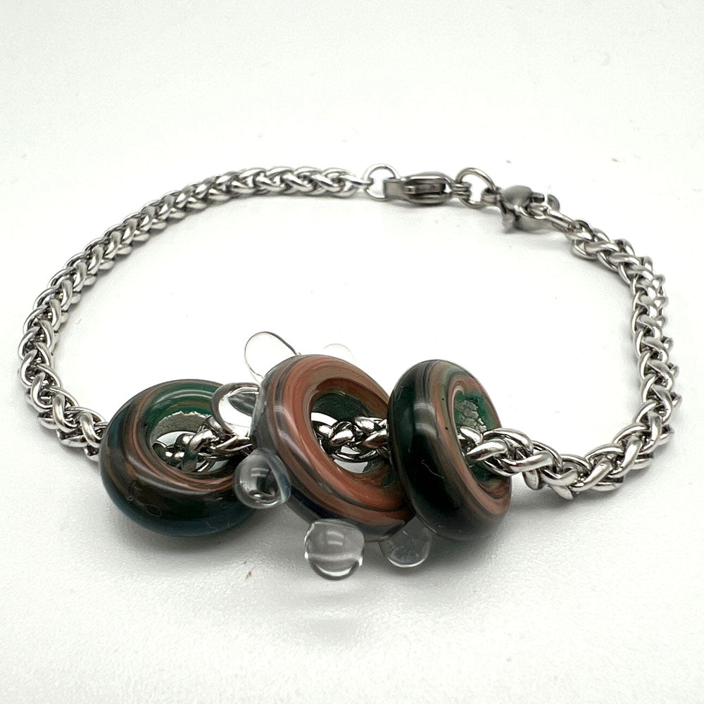 Bracelet with 3 dragons eye water droplet glass beads