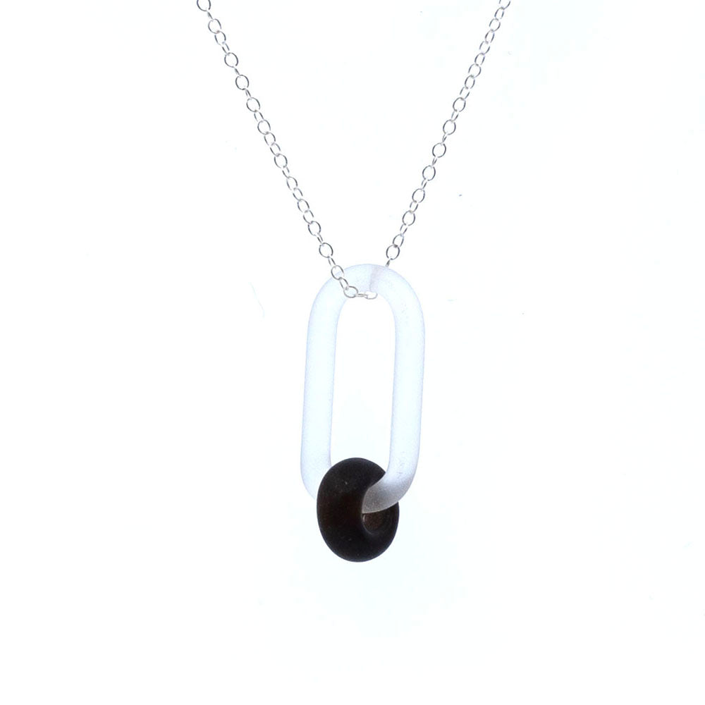 Necklace with clear link and dark brown bead made from a recycled beer bottle