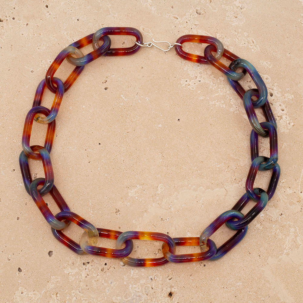 Glass chain link necklace made with Mai Tai glass. Mai Tai glass gives a multi colour finish so the links are orange, yellow,, red, pink and blue.