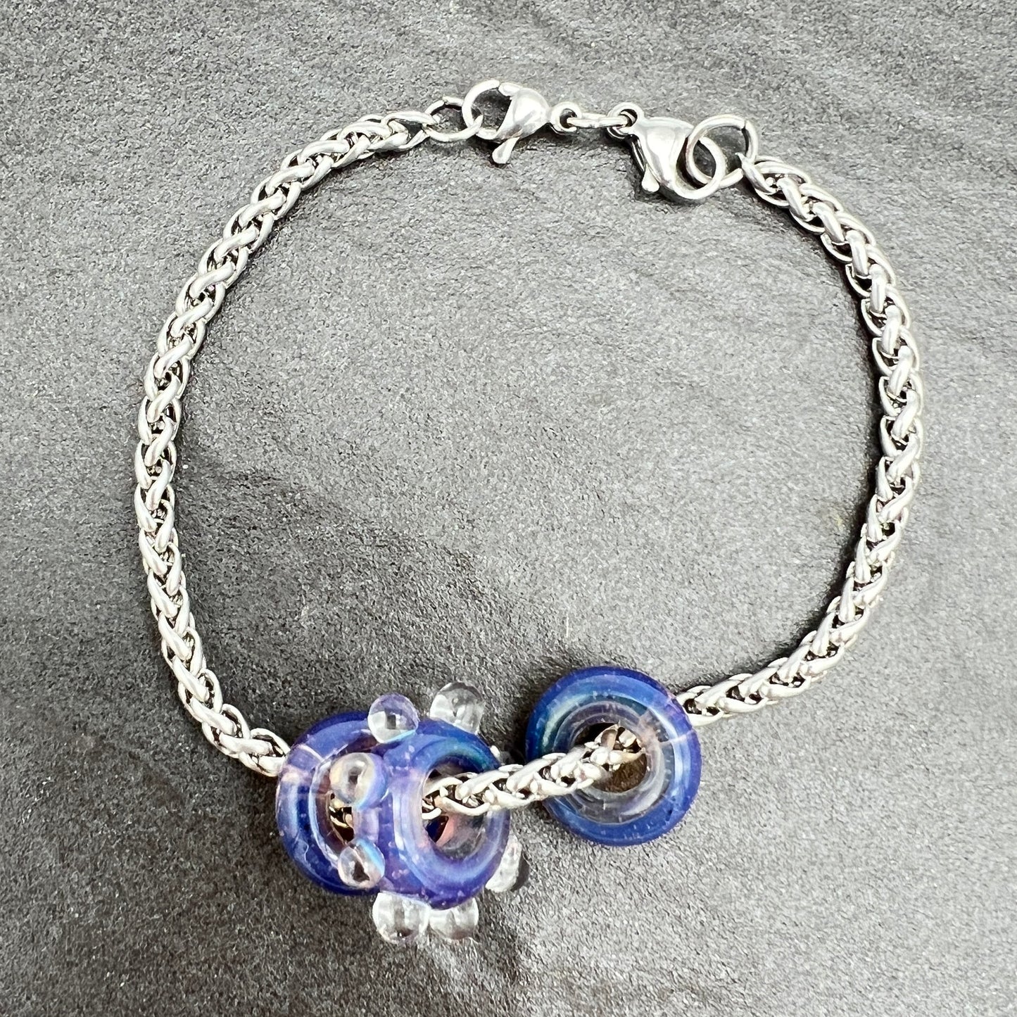 Bracelet with 3 purple iris water droplet glass beads