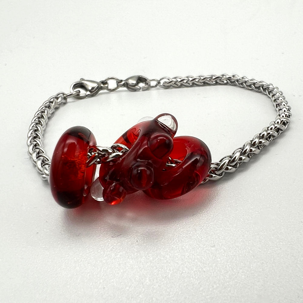 Bracelet with 3 red water droplet glass beads