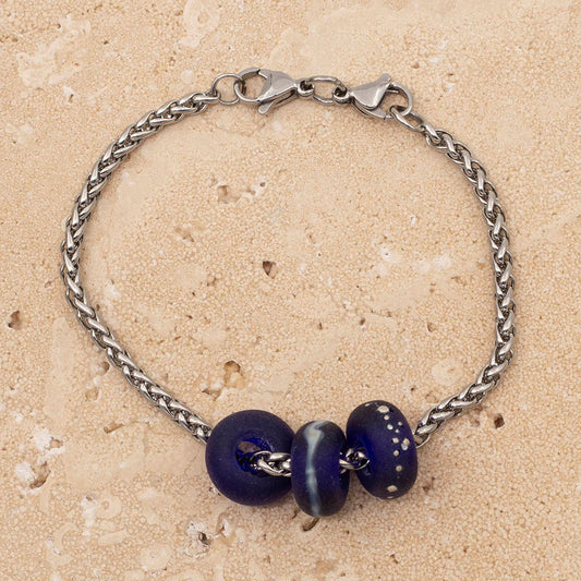 Bracelet with 3 frosted deep blue beach glass beads