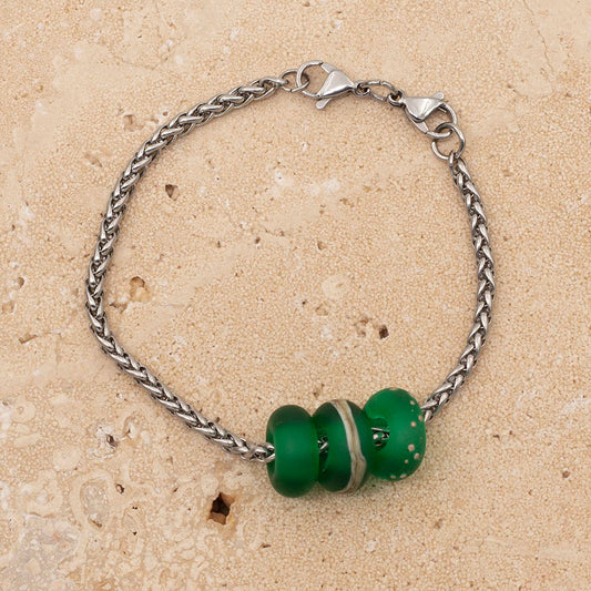 Bracelet with three frosted green glass beads on a stainless steel chain